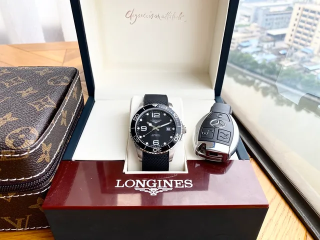 Longines काला चांदी डायल टेक्सचर्ड रबर स्ट्रैप यांत्रिक घड़ी 8