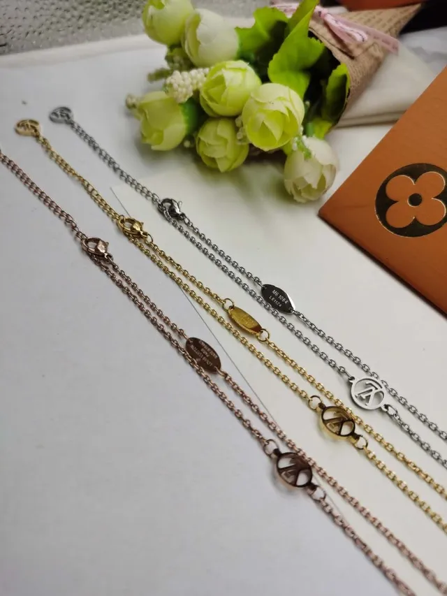Bracelete de corrente Louis Vuitton Alhambra prata e dourado com eslabões de quatrefoil abertos em metal polido 4