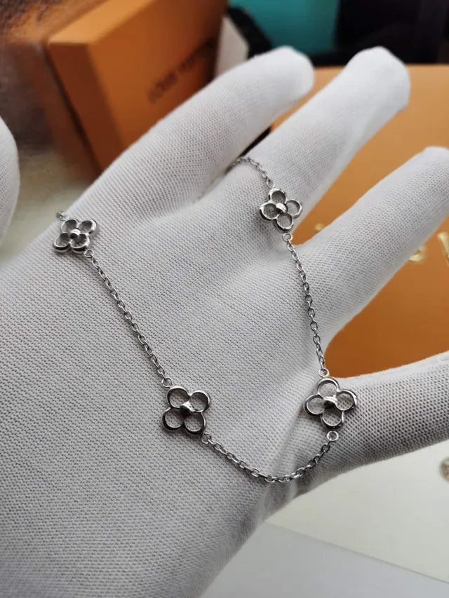Bracelete de corrente Louis Vuitton Alhambra prata e dourado com eslabões de quatrefoil abertos em metal polido 7