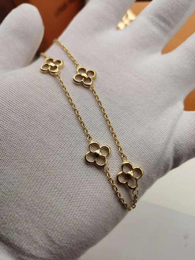 Bracelete de corrente Louis Vuitton Alhambra prata e dourado com eslabões de quatrefoil abertos em metal polido 9
