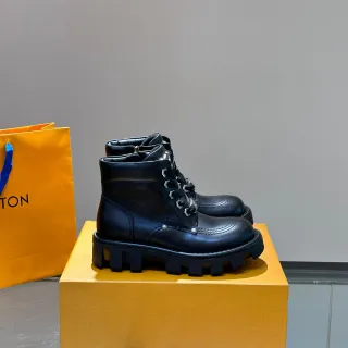 Louis Vuitton काले चमड़े मोटे लग सोल एंक्ल बूट्स