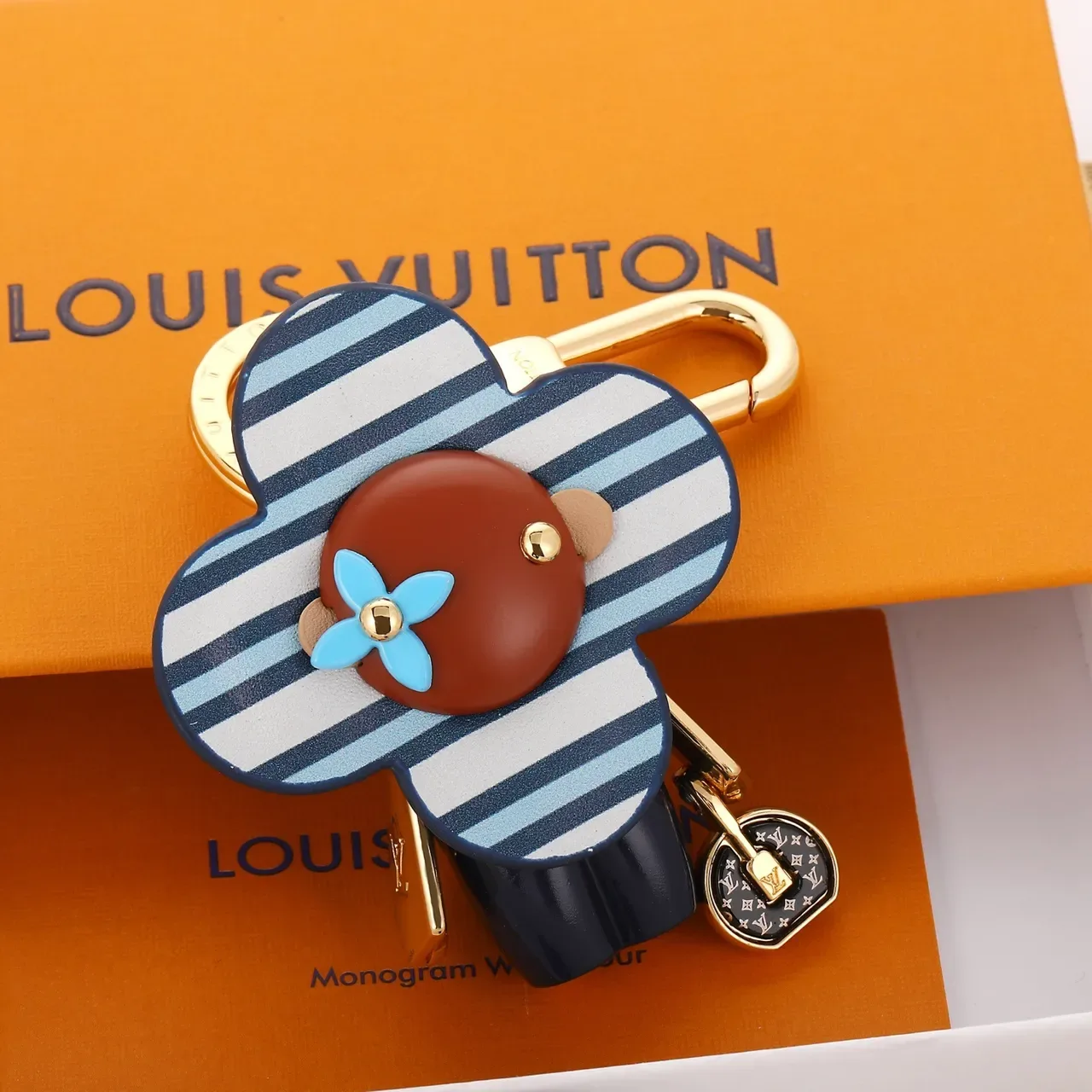 Louis Vuitton Flower Charm sac à main cuir rayé bleu marron avec quincaillerie dorée 3