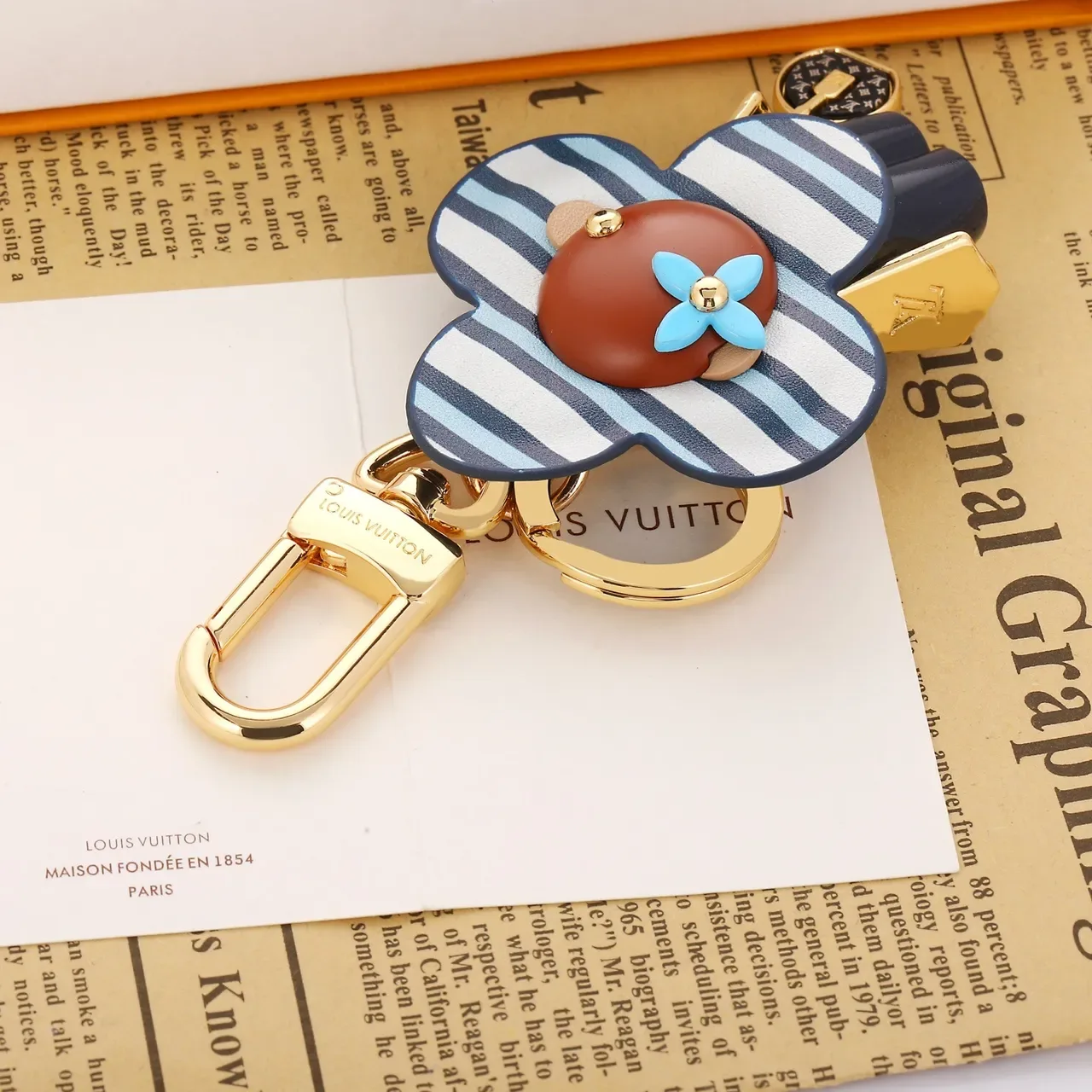 Louis Vuitton Flower Charm sac à main cuir rayé bleu marron avec quincaillerie dorée 6