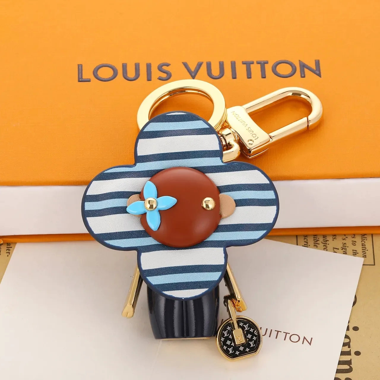 Louis Vuitton Flower Charm sac à main cuir rayé bleu marron avec quincaillerie dorée 8