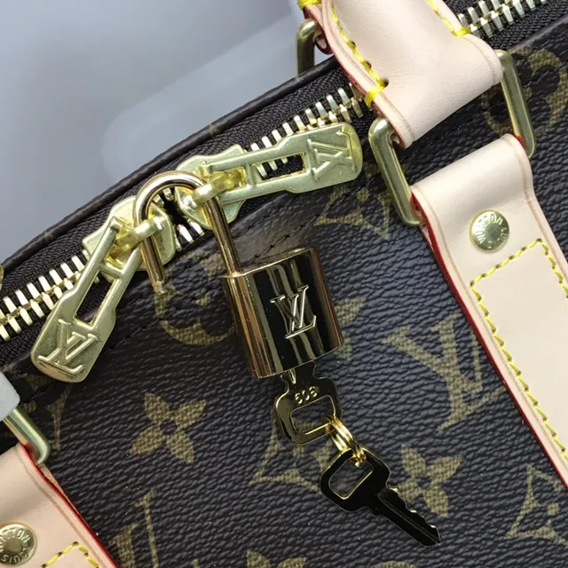 Louis Vuitton Keepall Bandoulière Monogram Canvas Marrón y Tan Duffle Bag 6