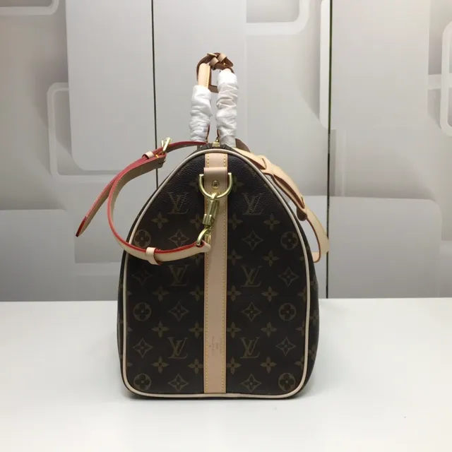 Louis Vuitton Keepall Bandoulière Monogram Canvas Marrón y Tan Duffle Bag 8
