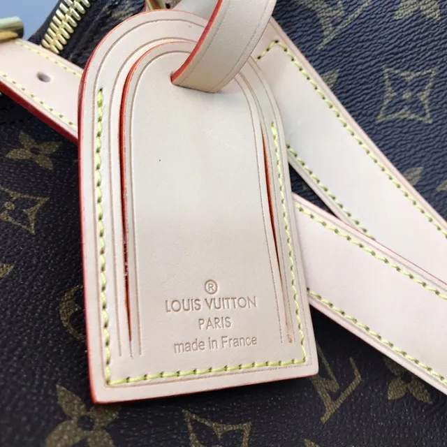 Louis Vuitton Keepall Bandoulière Monogram Canvas Marrón y Tan Duffle Bag 23