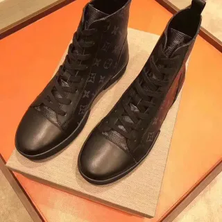 Louis Vuitton Le Cagole काली मोनोग्राम कैनवास एंगल बूट्स