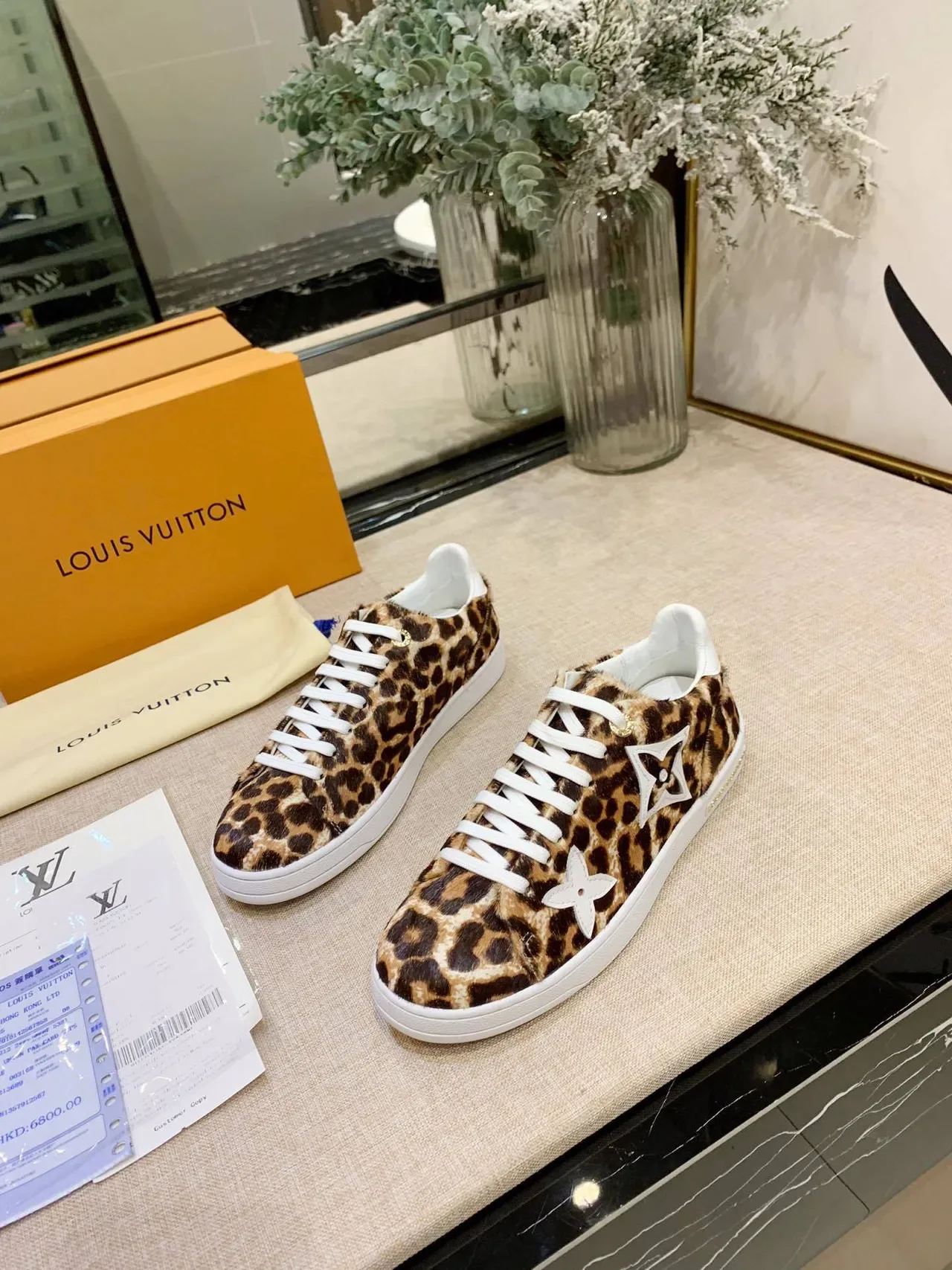 Louis Vuitton LV Trainer भूरा सफेद चितगोबरा प्रिंट बछड़े के बाल मोनोग्राम फूल ऐप्लिके Lifestyle Sneakers 3