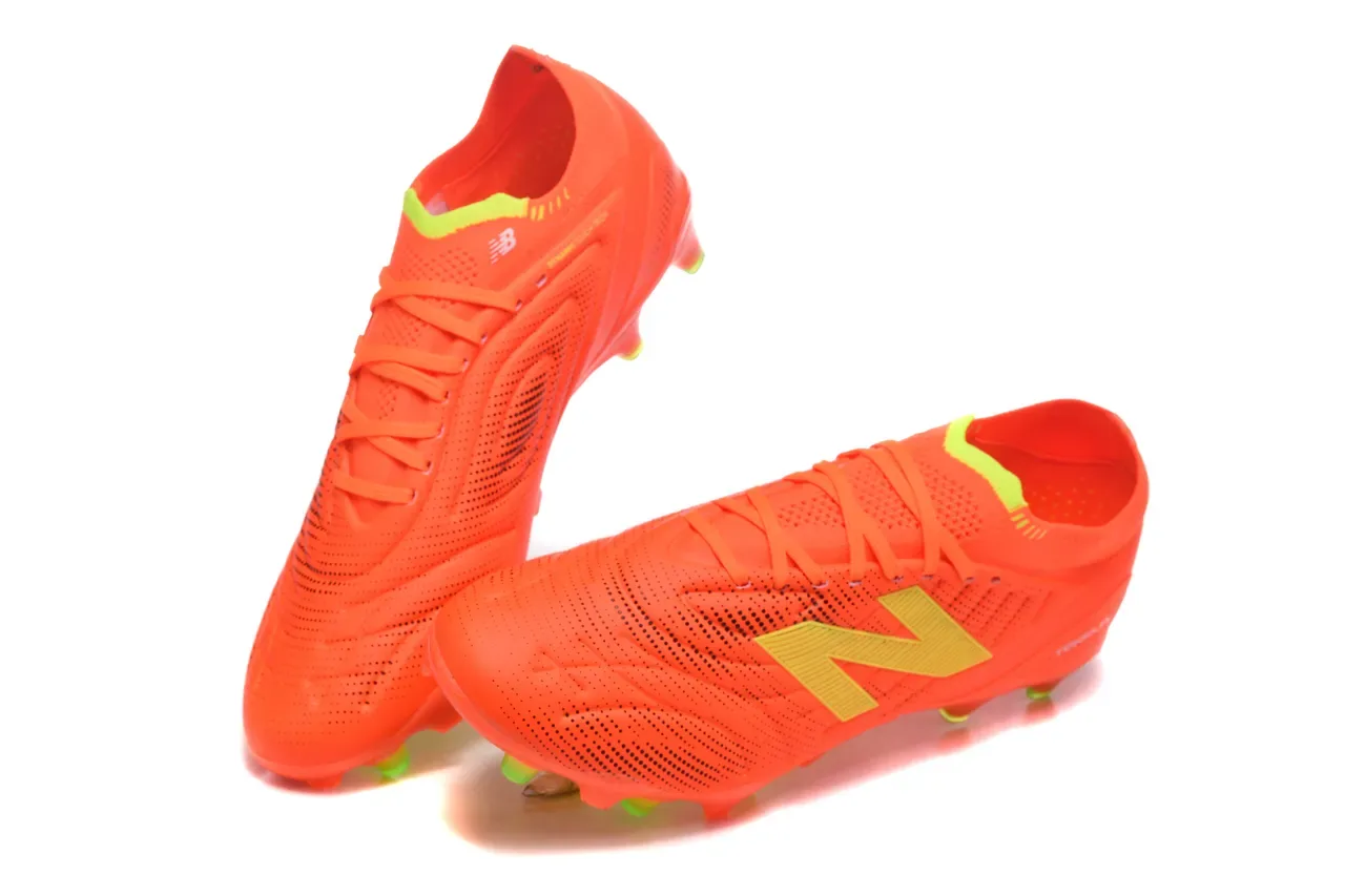 New Balance Tekela برتقالي أخضر، نعل mold studs، upper texturizado sintético، للأرض الصلبة، أحذية كرة القدم 2