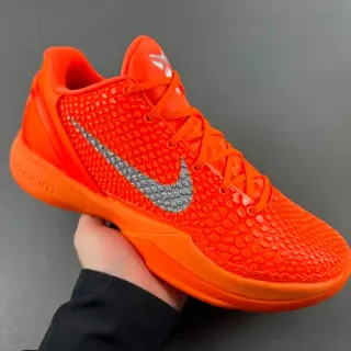 Nike Zapatillas de Baloncesto Naranja Plata Parte Superior Sintética Pébblée Silueta de Bajo Corte