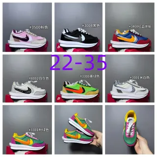 Nike حذاء أسلوب حياة بألوان وردي وبنفسجي مع upper شبكي-ماتشو متعدد الطبقات مع كعب وسطي مزدوج الطبقات