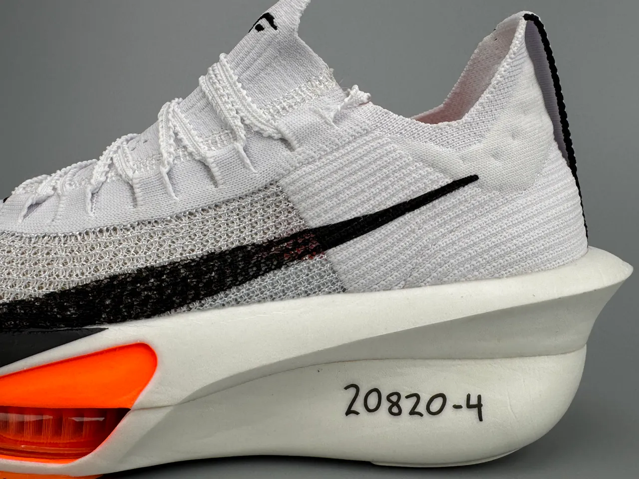 Nike White Black Knit Upper Sculpted Midsole Running Shoes 3