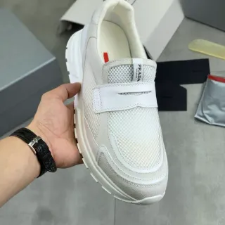 Prada Cloudbust श्वेत मेश और सूड स्लिप-ऑन लाइफस्टाइल स्नीकर
