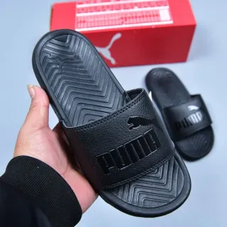 Puma Slide काला एक पट्टी उभरा हुआ ब्रांडिंग चप्पल