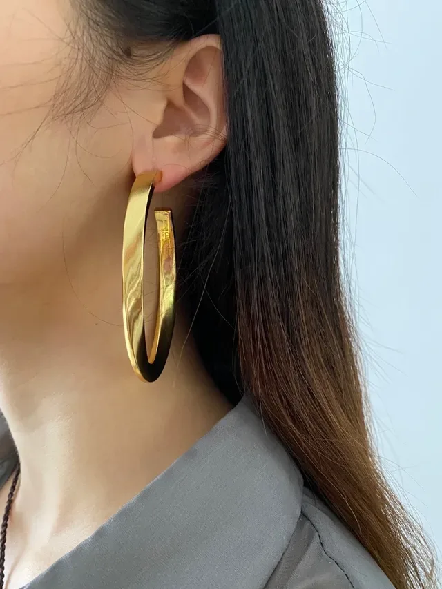 Saint Laurent Twisted Hoop Polished Gold Earrings 2