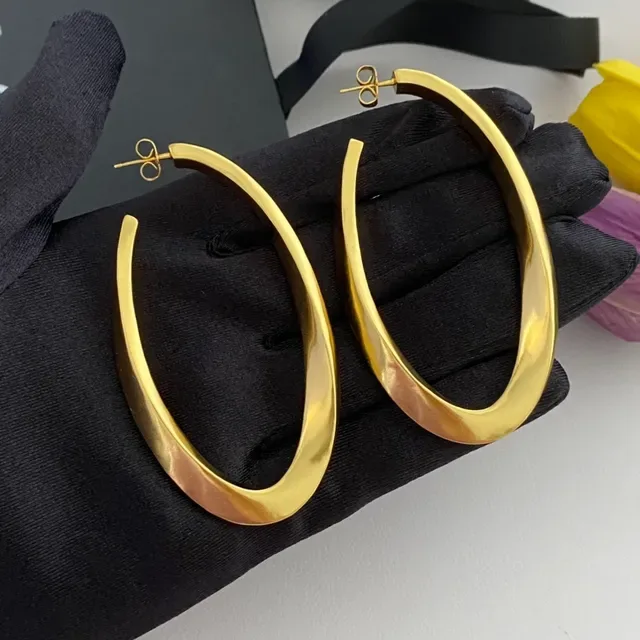 Saint Laurent Twisted Hoop Polished Gold Earrings 6
