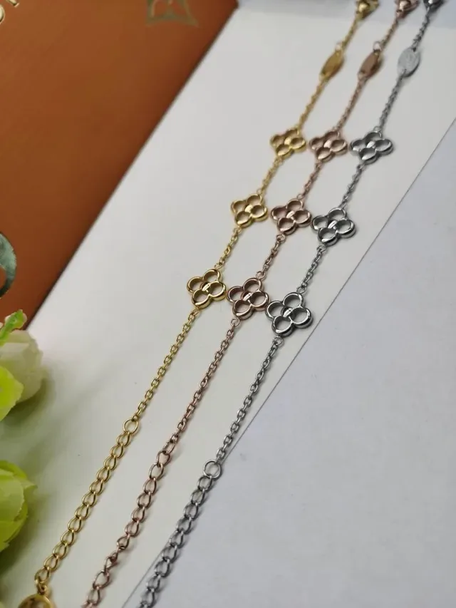 Van Cleef & Arpels सोने की चेन चार पत्ती क्लोवर मोटिफ्स कंगन 9