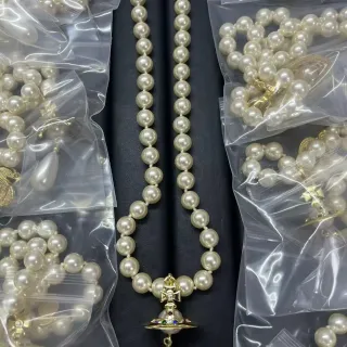 Vivienne Westwood Orb Necklace Beige Gold Pearl Strand Pendant Necklace