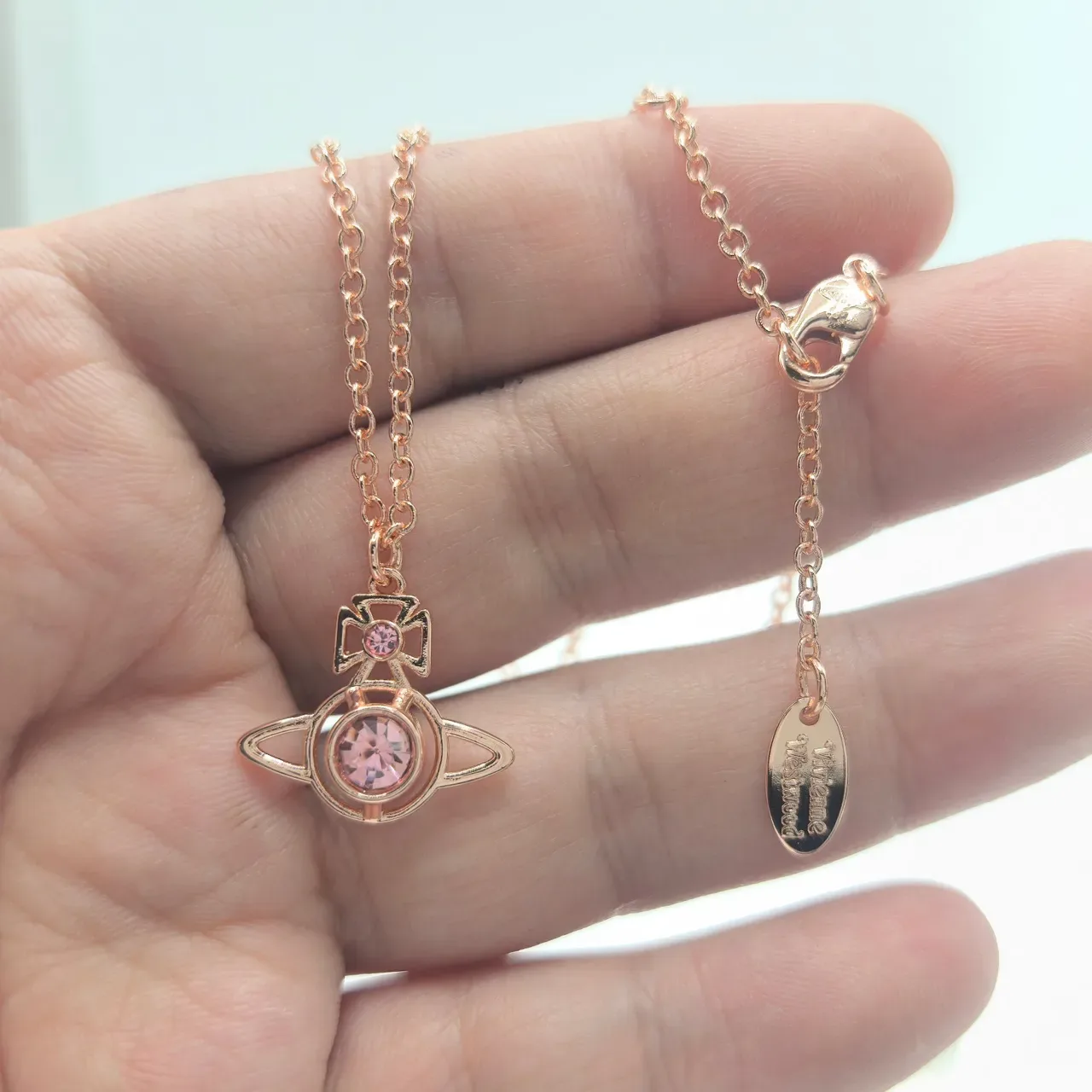 Vivienne Westwood Orb Pendant Necklace Rose Gold Pink Crystal and Silver Clear Crystal Necklaces 2