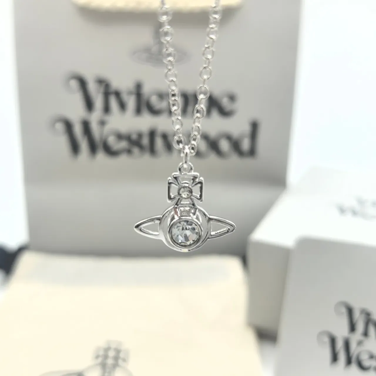 Vivienne Westwood Orb Pendant Necklace Rose Gold Pink Crystal and Silver Clear Crystal Necklaces 3