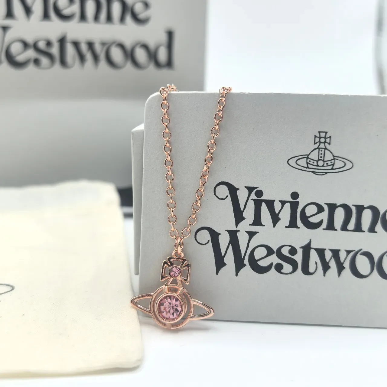 Vivienne Westwood Orb Pendant Necklace Rose Gold Pink Crystal and Silver Clear Crystal Necklaces 6