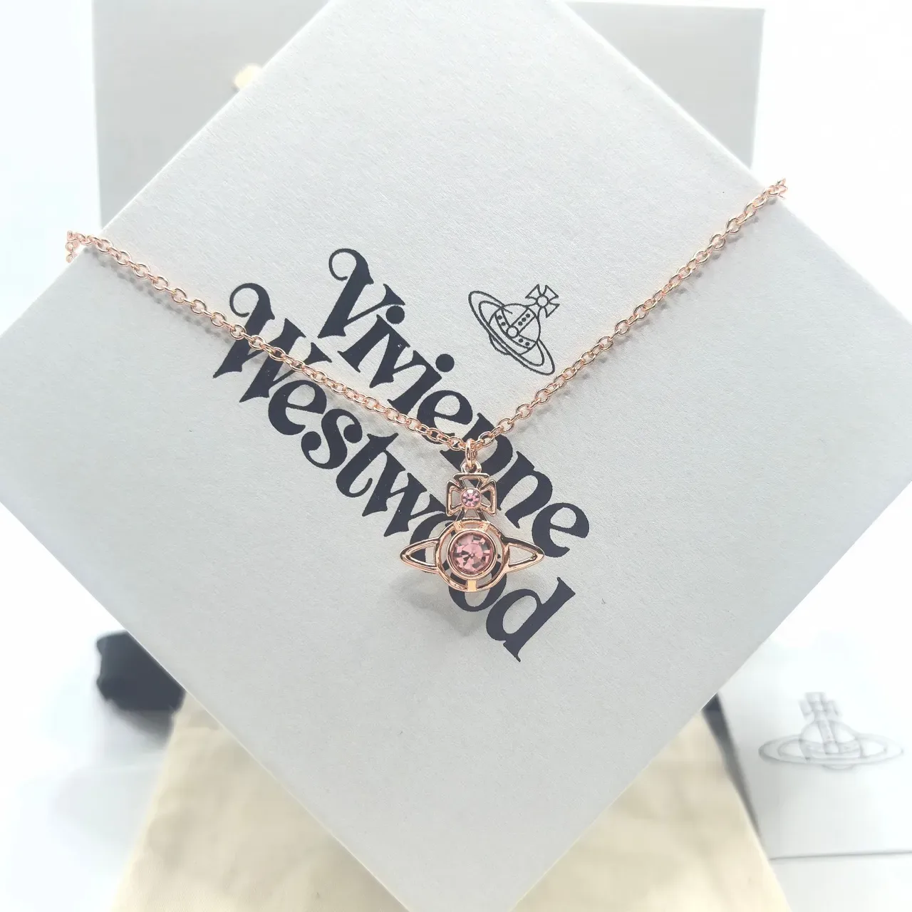 Vivienne Westwood Orb Pendant Necklace Rose Gold Pink Crystal and Silver Clear Crystal Necklaces 8