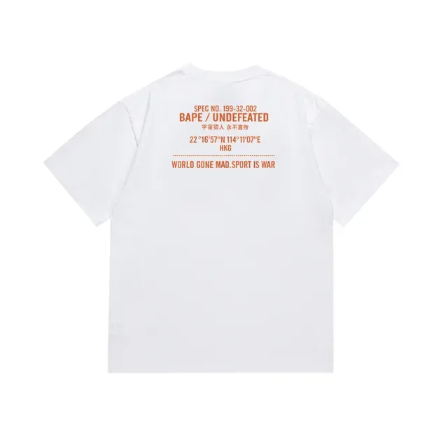A Bathing Ape BAPE x UNDEFEATED T-shirt camouflage à imprimé graphique noir et orange 6