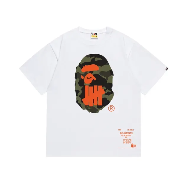 A Bathing Ape BAPE x UNDEFEATED T-shirt camouflage à imprimé graphique noir et orange 7