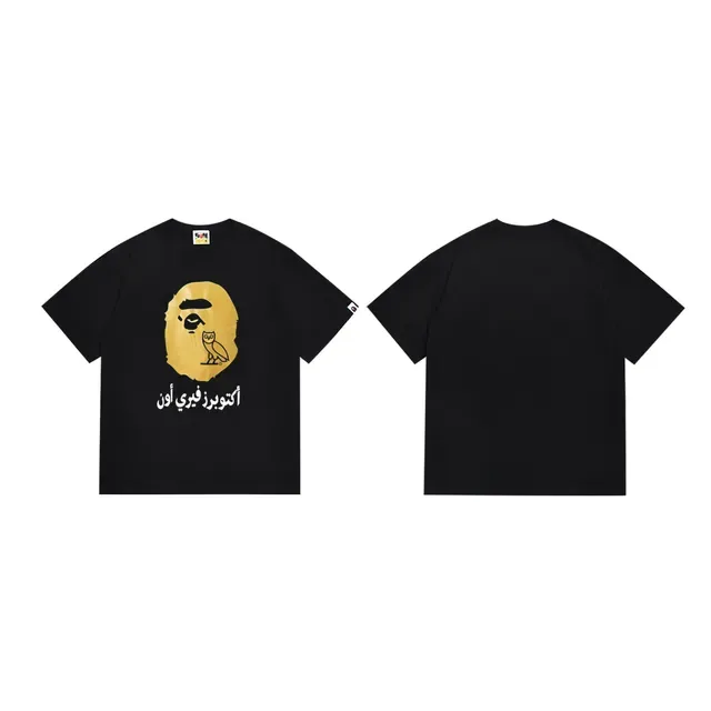 Camiseta gráfica A Bathing Ape x OVO com cabeça de macaco e coruja dourada 3