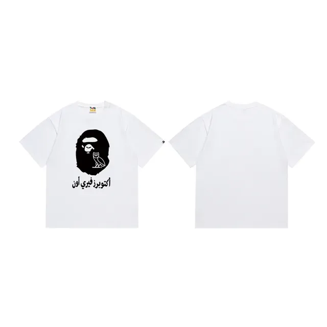 Camiseta gráfica A Bathing Ape x OVO com cabeça de macaco e coruja dourada 4