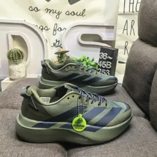 Adidas أخضر الجيش أزرق بحري الجزء العلوي من الشبكة المهندس منتصف الكعب مع Boost منحوت حذاء رياضي أسلوب حياة