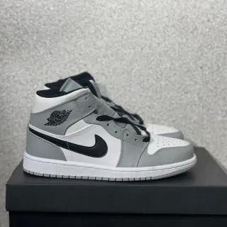 Tênis de basquete de cano alto Air Jordan cinza e branco com cabedal em couro e material sintético