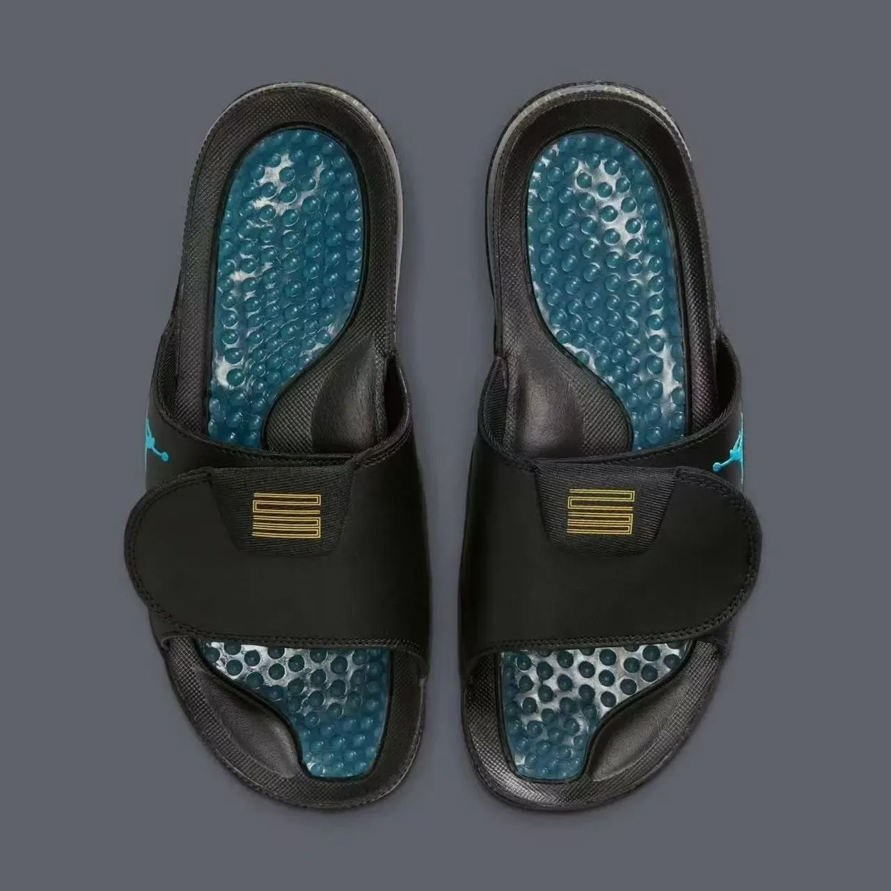Air Jordan Slide أسود أزرق Patent Toe Bumper تركواز Jumpman Logo نعال 3