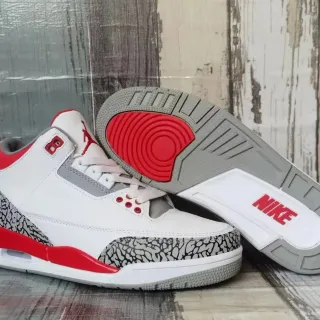 Tênis de basquete Air Jordan de cano alto branco e vermelho com estampa de elefante