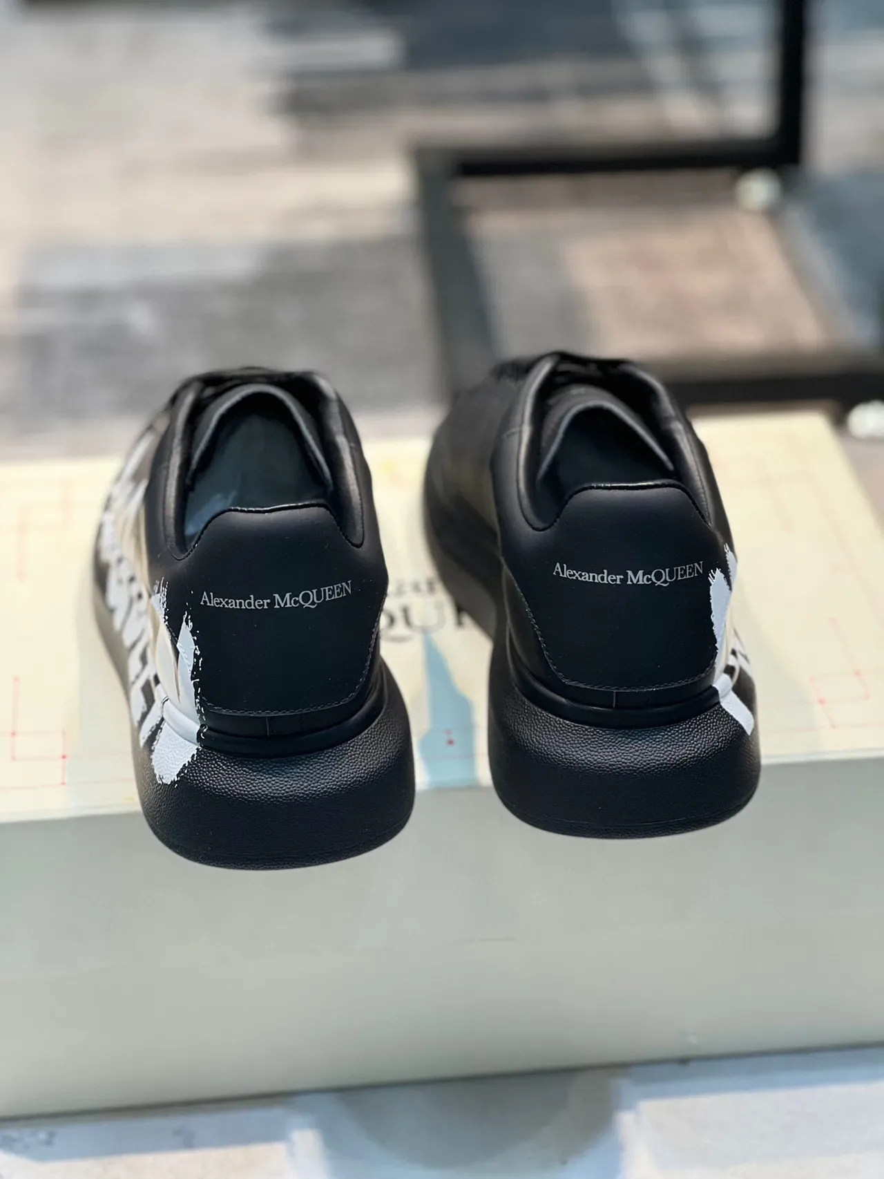 Alexander McQueen Oversized Sneaker Black White Platform Sole Graffiti-Style Logo Lifestyle Sneakers 3