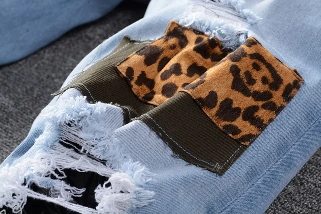 Amiri Jeans con Patchwork Distressed Logo 8