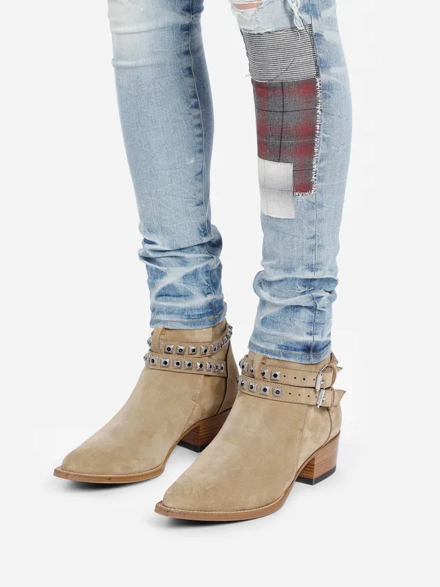 Amiri Jeans con Patchwork Distressed Logo 16