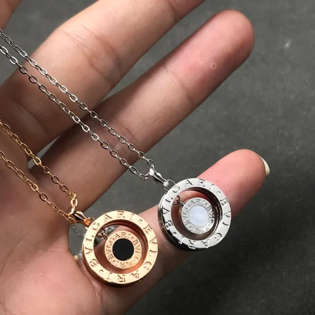 Bvlgari B.zero1 قلادة ذهب فضة متحدة المركز مزدوجة الحلقات منحوتة بحروف العلامة التجارية 2