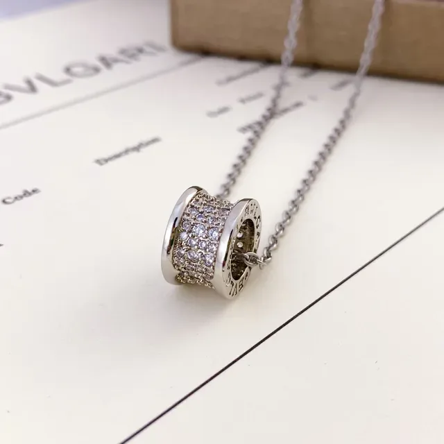 Bvlgari সোনা রুপা গোলাকার ব্যারেল চার্ম পাভে সেট ক্রিস্টাল হার 3