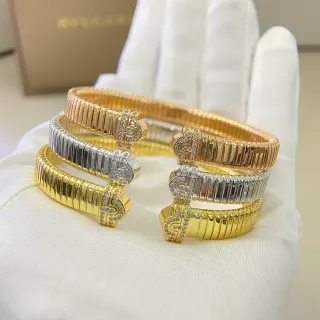 Bvlgari Tubogas Bracelet Yellow Gold White Gold Pavé Stone Clasp Bracelets