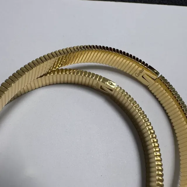 Cartier Juste un Clou أساور صلبة بلون ذهبي مخددة 6