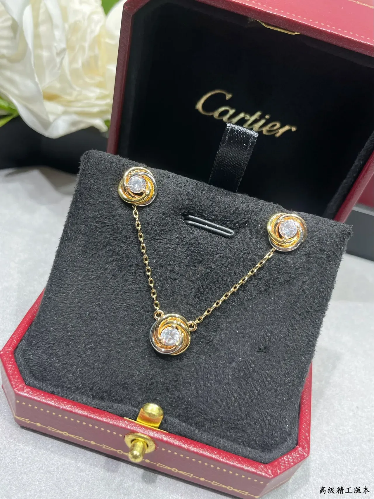 Cartier Swirling Dual-Tone Gold Stud Earrings 3