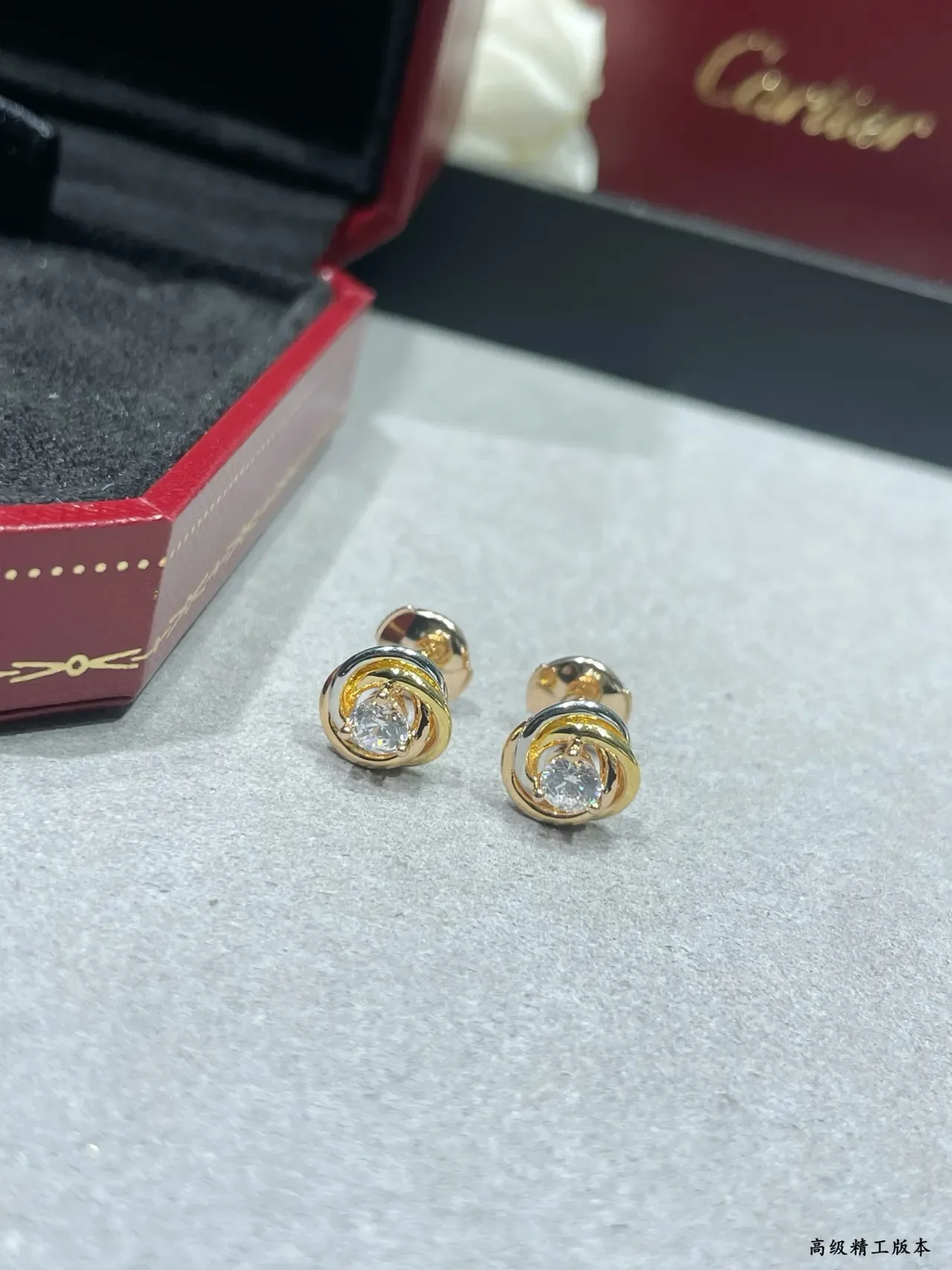 Cartier Swirling Dual-Tone Gold Stud Earrings 6