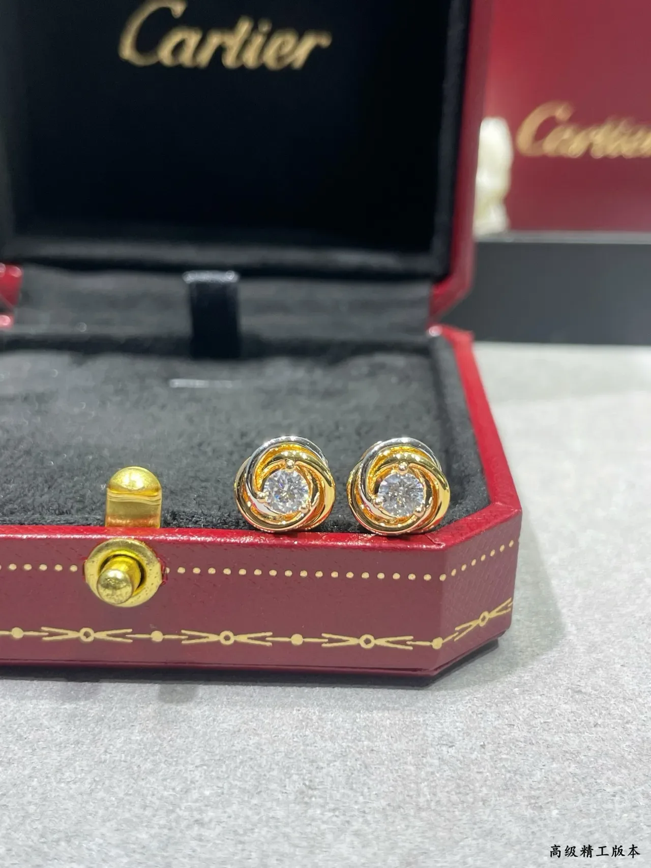 Cartier Swirling Dual-Tone Gold Stud Earrings 7