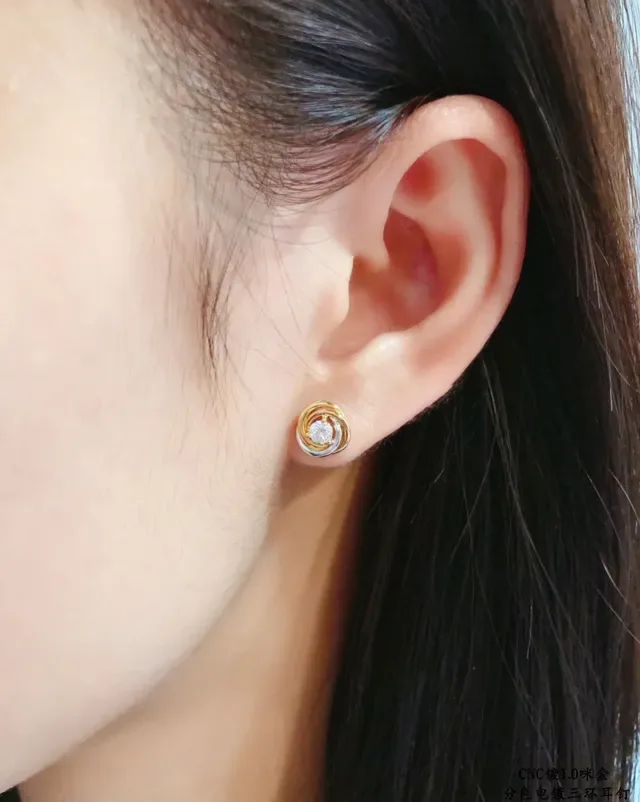 Cartier Swirling Dual-Tone Gold Stud Earrings 8