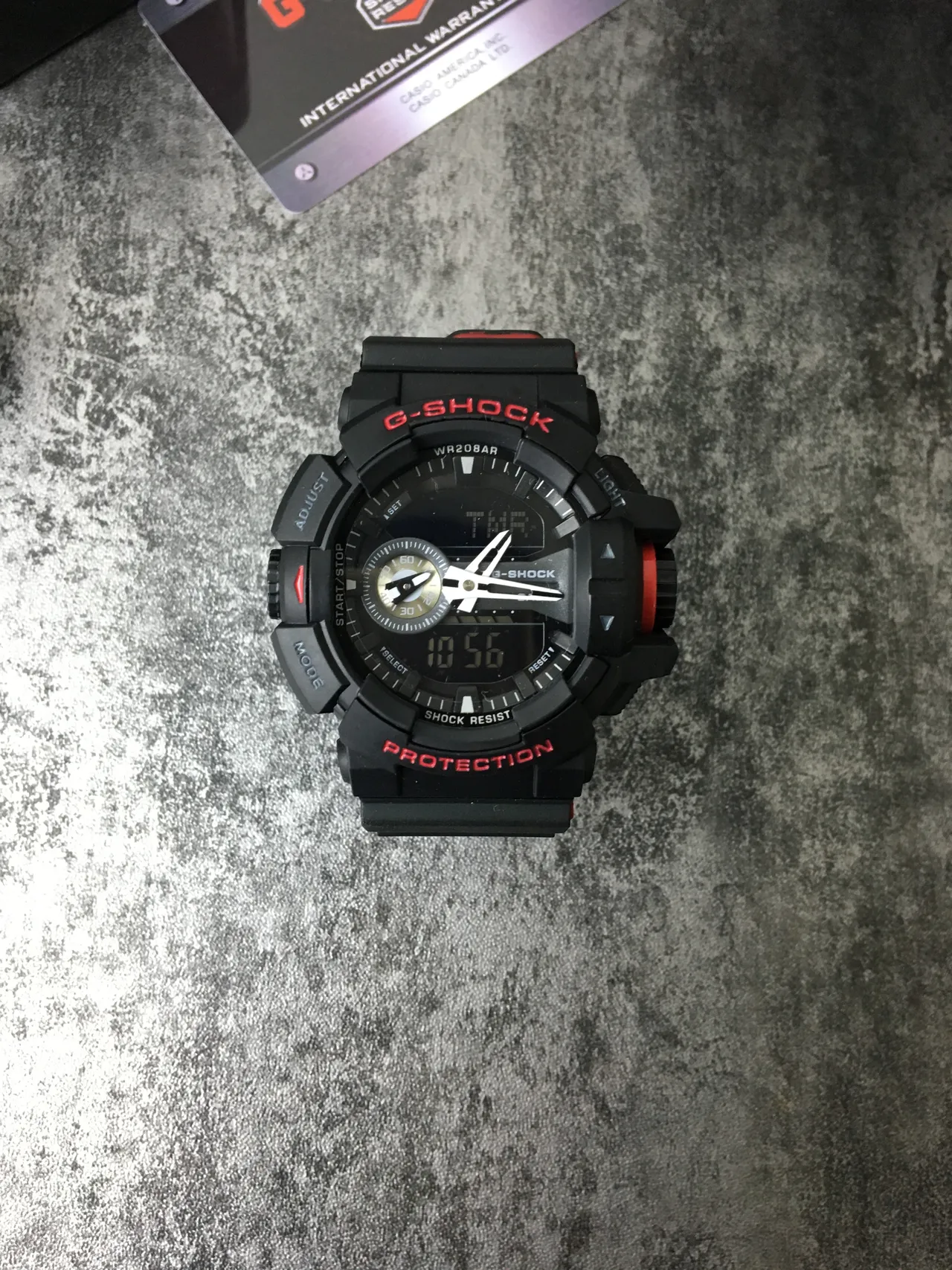 कासियो G-Shock GA-100 काला और लाल मजबूत एनालॉग-डिजिटल स्पोर्ट्स वॉच 3