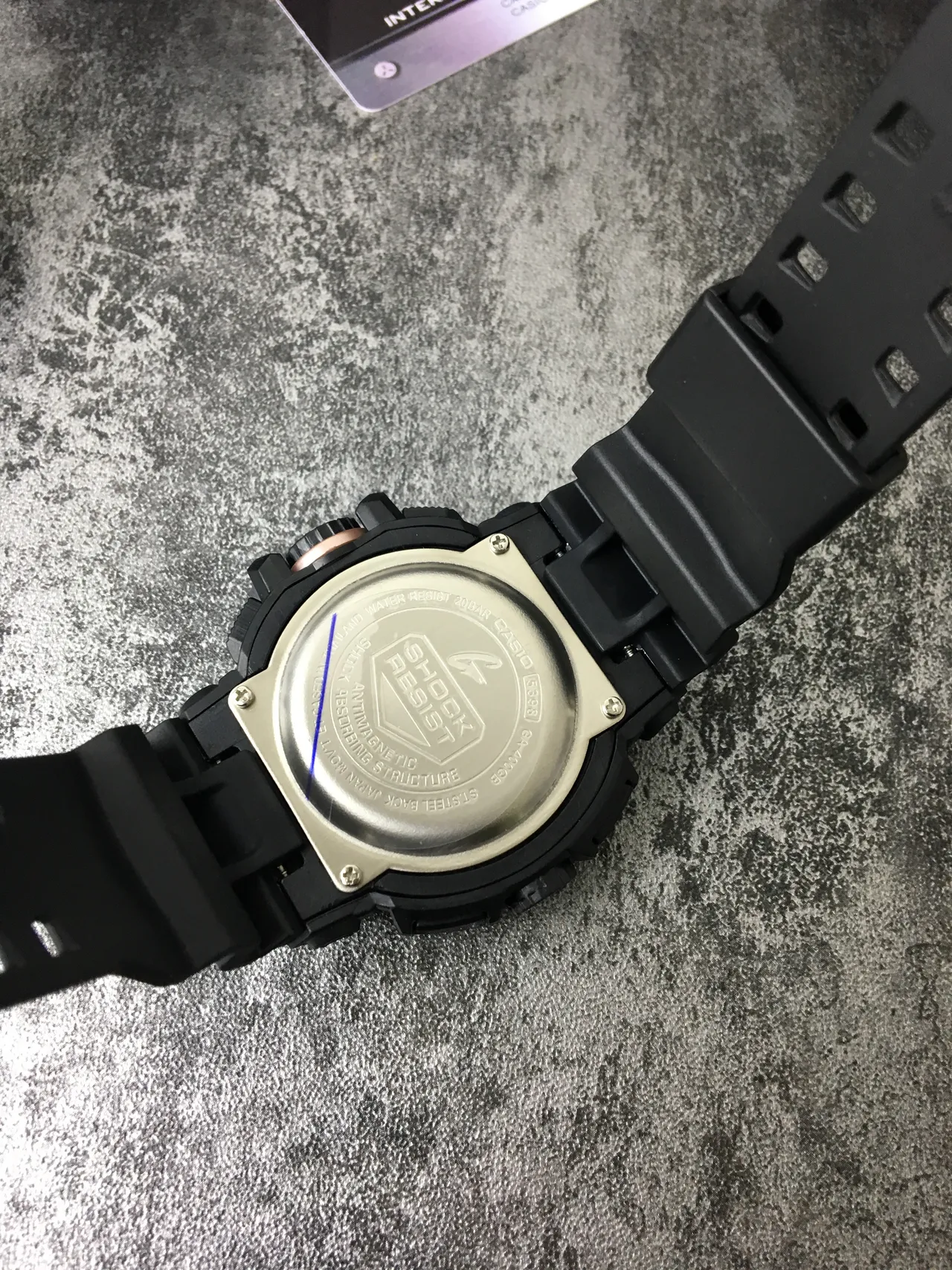 Casio G-Shock GA-100 أسود وذهب وردي ساعة رياضية 4