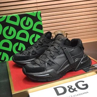 Dolce & Gabbana baskets noirs monocromatiques en matériau multiple sur la partie supérieure épaisses