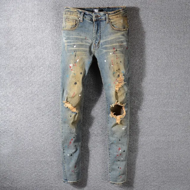 Jean bleu slim-fit distressed avec éclaboussures de peinture 2